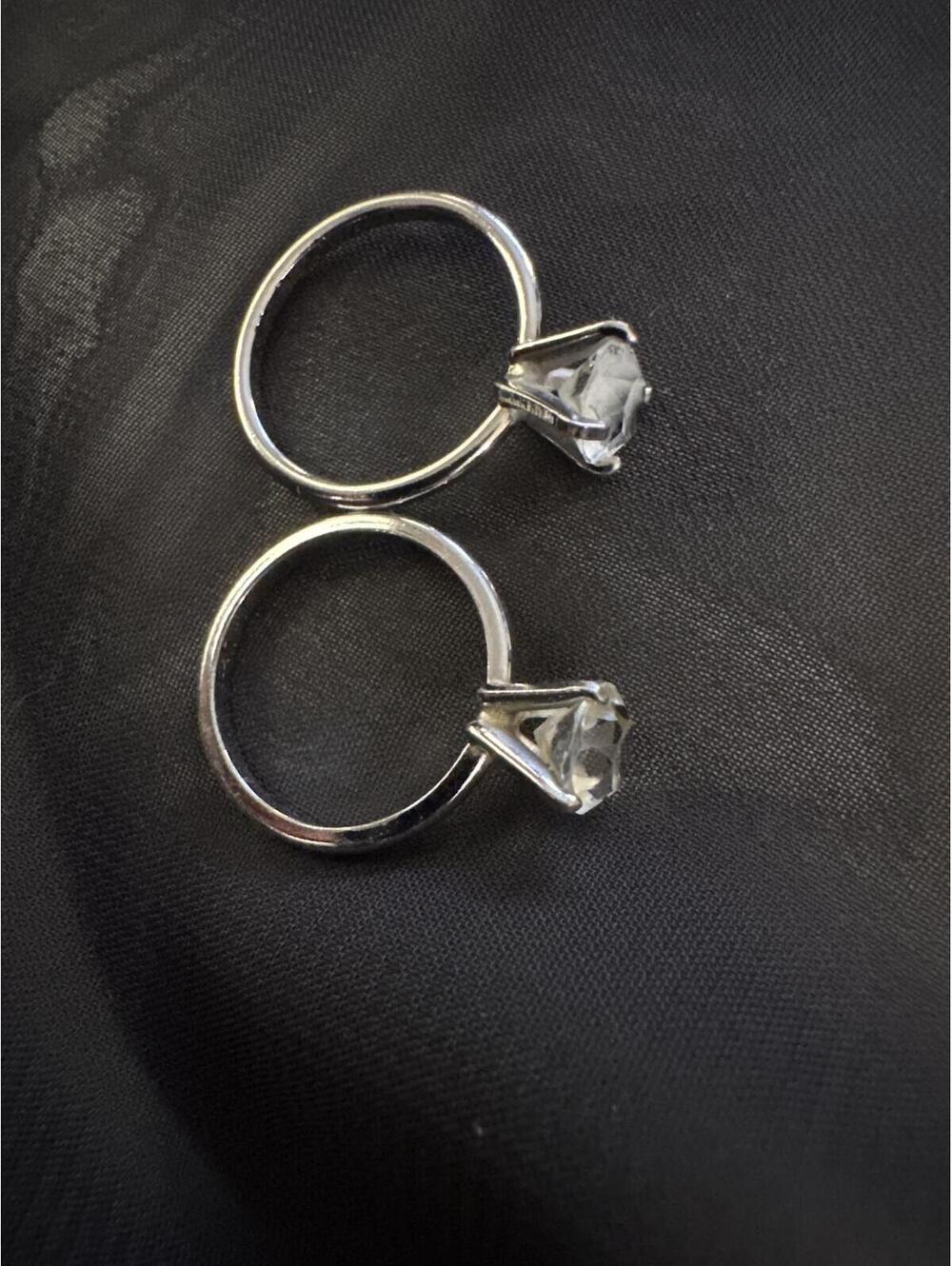 Set of Two Silver Tone Rings with Clear Round Gemstones